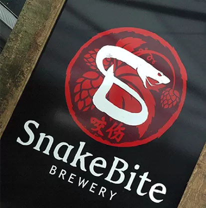 logo design for snakebite brewery franz josef